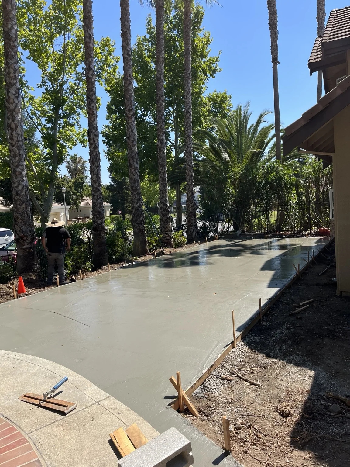 Concrete patio installation by JL Landscaping